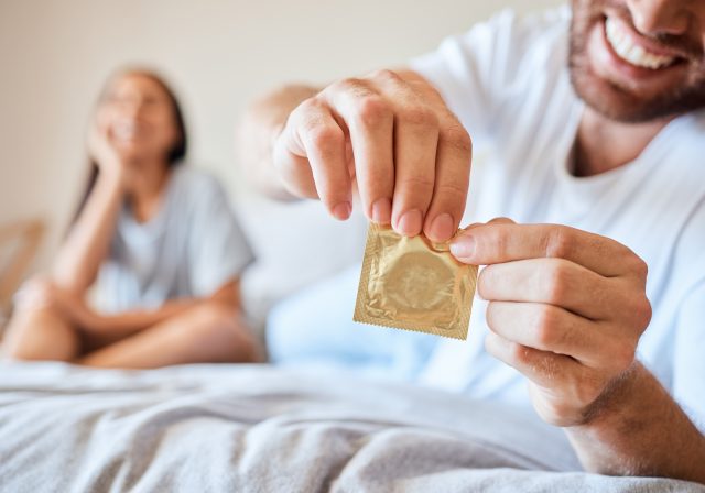 vecteezy_condom-sex-and-safety-for-sexual-couple-in-bed-together_76054919